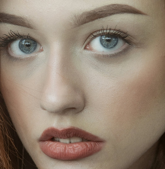 a close up of a woman's face