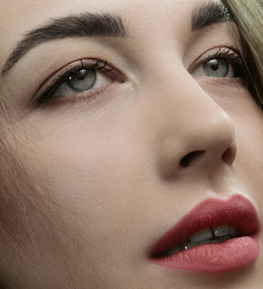 a close up of a woman with long hair